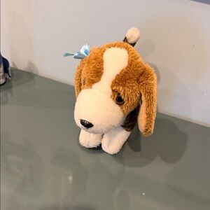 Adorable Plush Puppy with Blue Bow